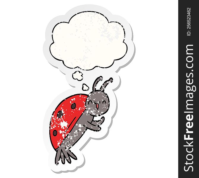 cute cartoon ladybug with thought bubble as a distressed worn sticker