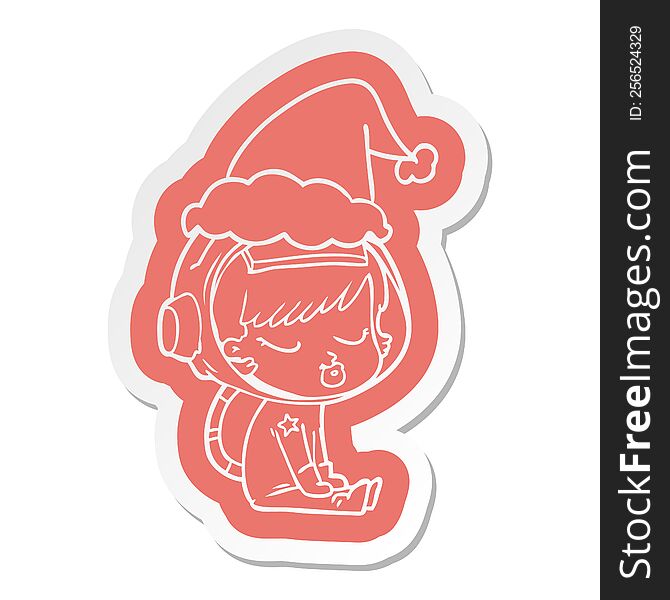 cartoon  sticker of a pretty astronaut girl sitting waiting wearing santa hat