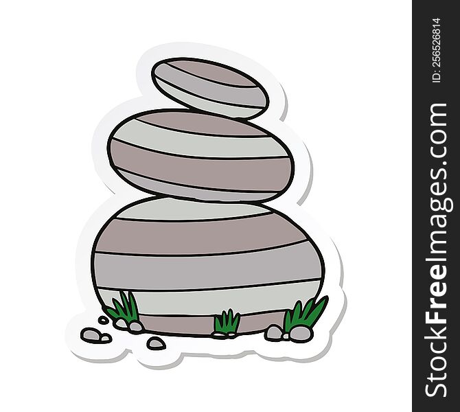 sticker of a cartoon large stacked stones