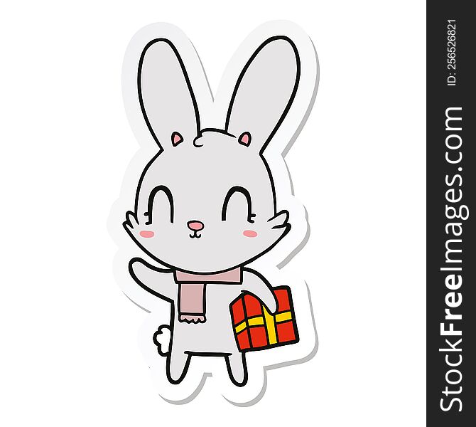 Sticker Of A Cute Cartoon Rabbit With Christmas Present