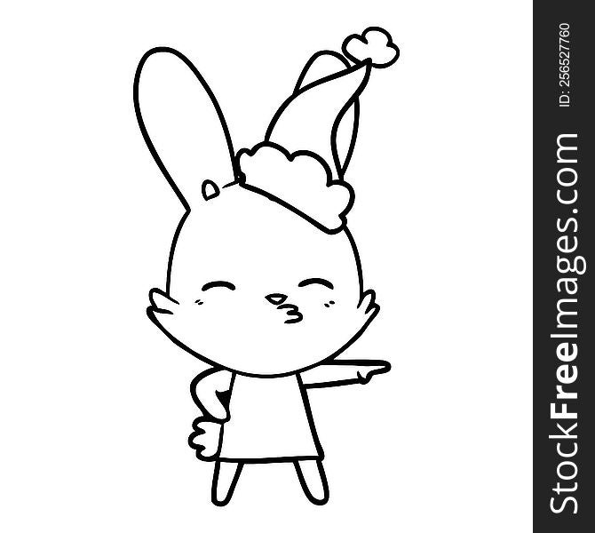 curious bunny hand drawn line drawing of a wearing santa hat. curious bunny hand drawn line drawing of a wearing santa hat