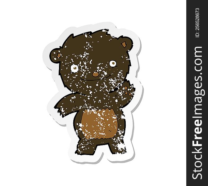 Retro Distressed Sticker Of A Cartoon Waving Black Bear Cub