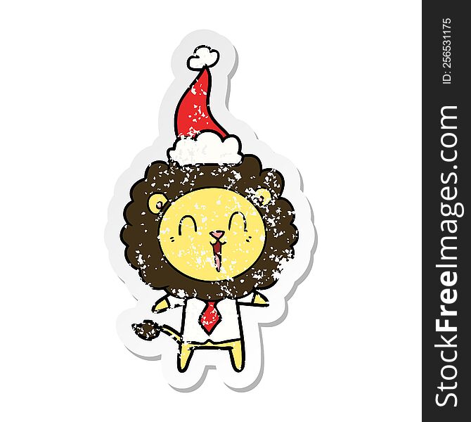 Laughing Lion Distressed Sticker Cartoon Of A Wearing Santa Hat