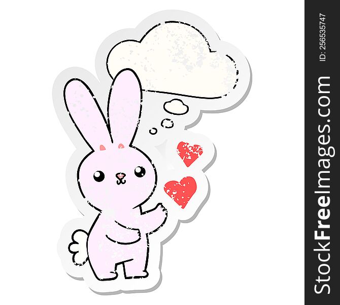 cute cartoon rabbit with love hearts with thought bubble as a distressed worn sticker