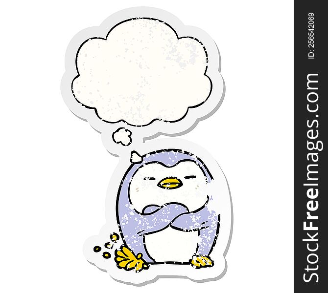 cartoon penguin tapping foot with thought bubble as a distressed worn sticker