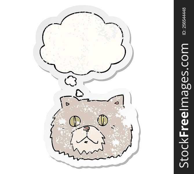 cartoon cat face with thought bubble as a distressed worn sticker