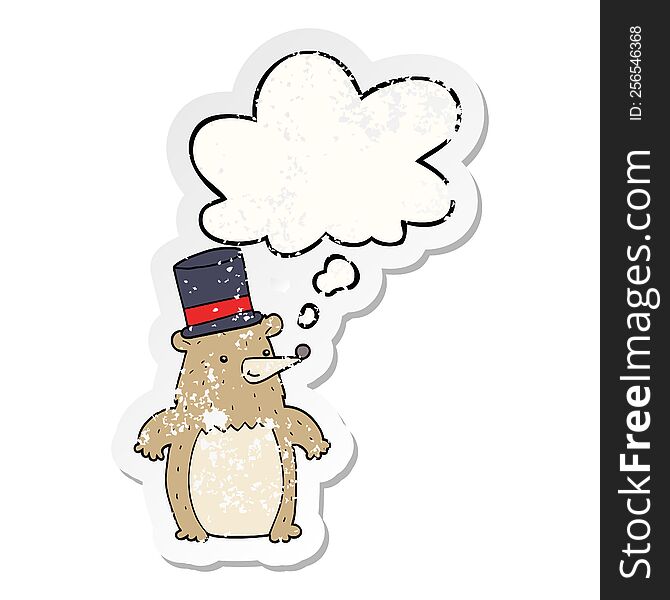 Cartoon Bear In Top Hat And Thought Bubble As A Distressed Worn Sticker