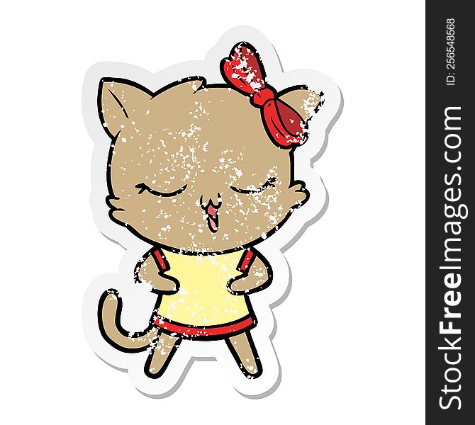 distressed sticker of a cartoon cat with bow on head