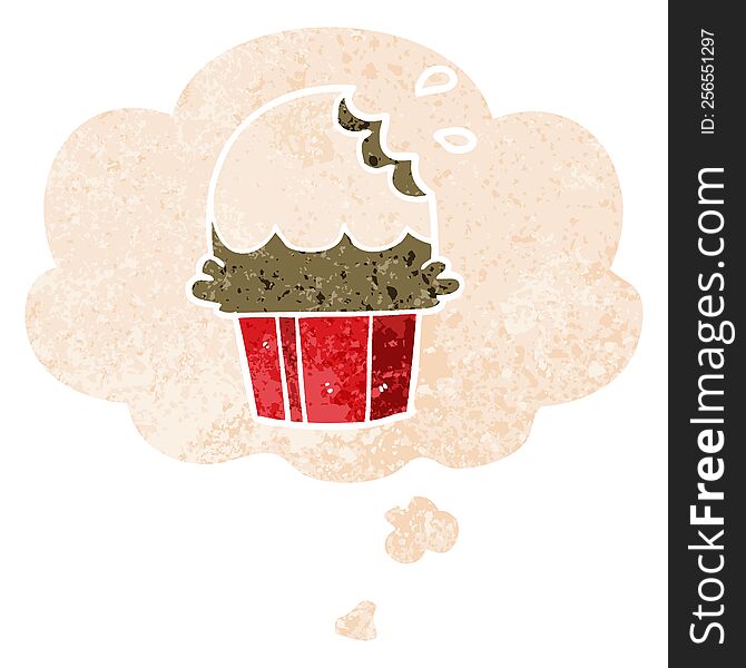 cartoon cupcake with thought bubble in grunge distressed retro textured style. cartoon cupcake with thought bubble in grunge distressed retro textured style