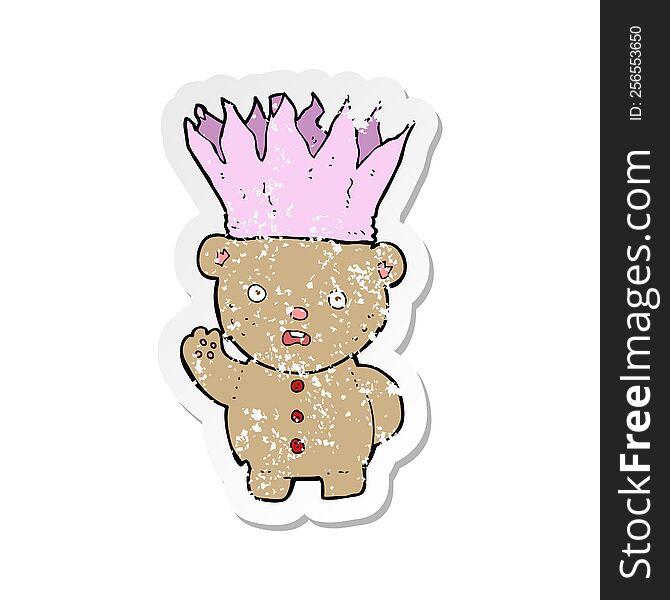 Retro Distressed Sticker Of A Cartoon Teddy Bear Wearing Paper Crown