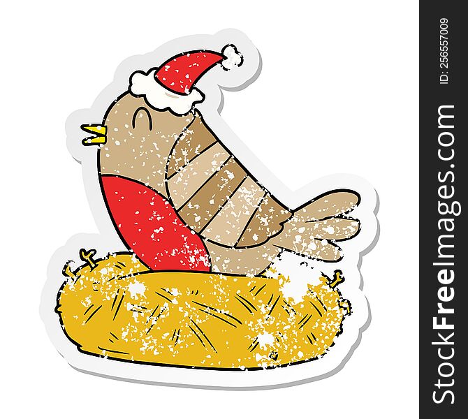 Distressed Sticker Cartoon Of A Bird Sitting On Nest Wearing Santa Hat