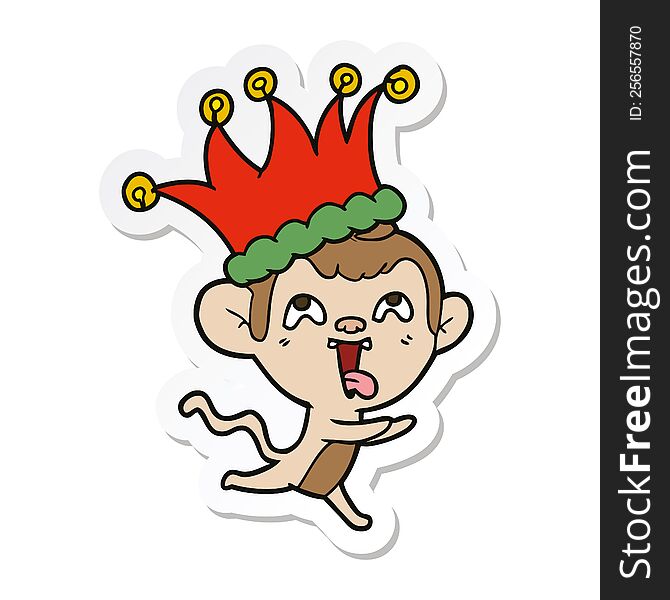 sticker of a crazy cartoon monkey wearing jester hat