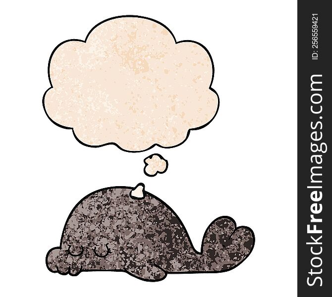cartoon seal with thought bubble in grunge texture style. cartoon seal with thought bubble in grunge texture style