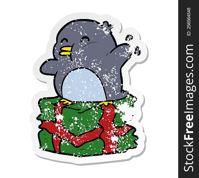 Distressed Sticker Of A Cartoon Penguin On Present