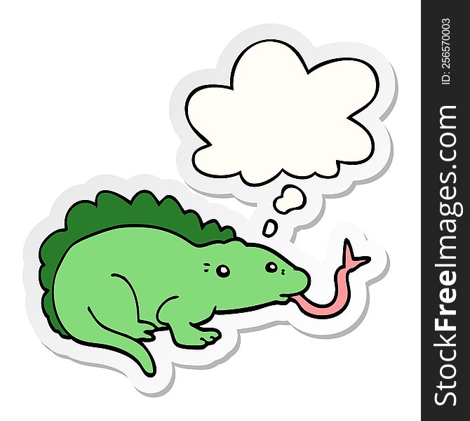 cartoon lizard with thought bubble as a printed sticker