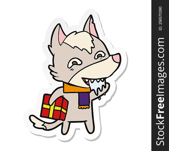 sticker of a cartoon hungry wolf holding christmas present