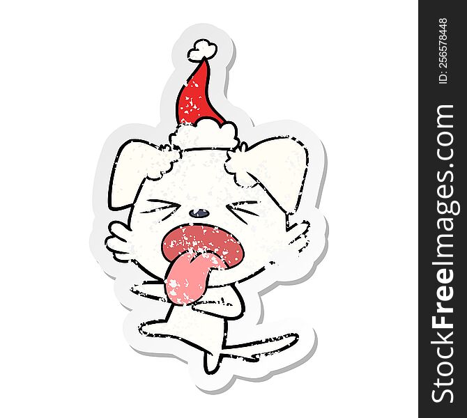 Distressed Sticker Cartoon Of A Disgusted Dog Wearing Santa Hat