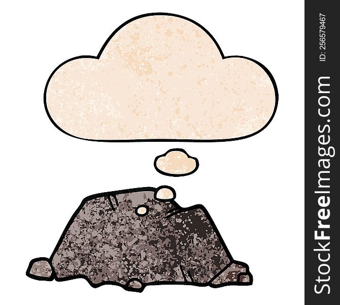 cartoon rock with thought bubble in grunge texture style. cartoon rock with thought bubble in grunge texture style