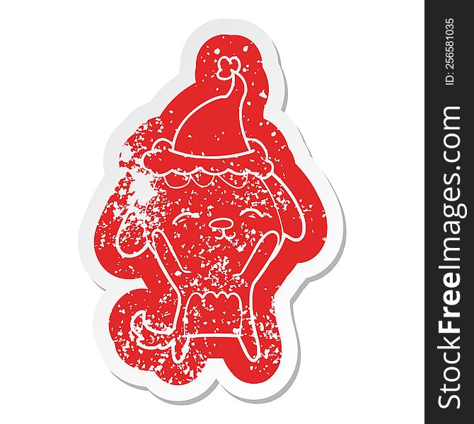 Happy Cartoon Distressed Sticker Of A Dog Wearing Santa Hat