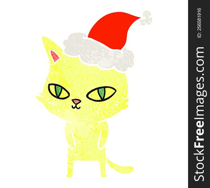 hand drawn retro cartoon of a cat with bright eyes wearing santa hat