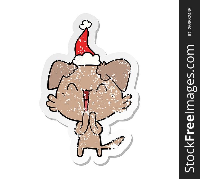 Laughing Little Dog Distressed Sticker Cartoon Of A Wearing Santa Hat