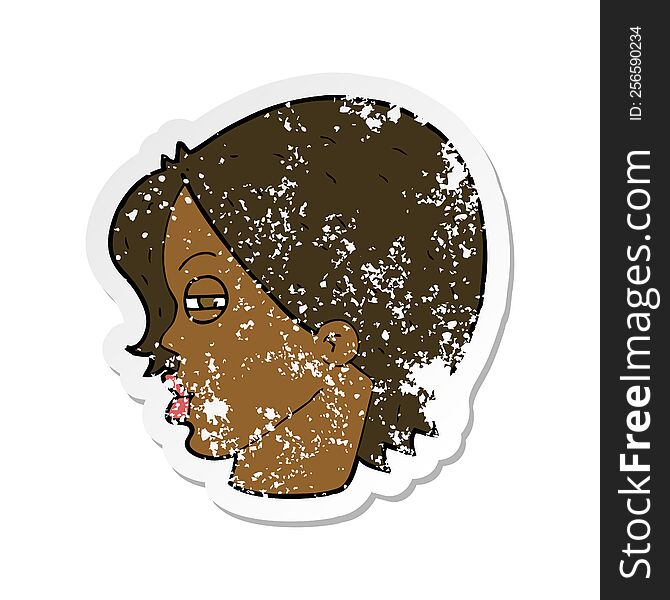 retro distressed sticker of a cartoon female face with narrowed eyes
