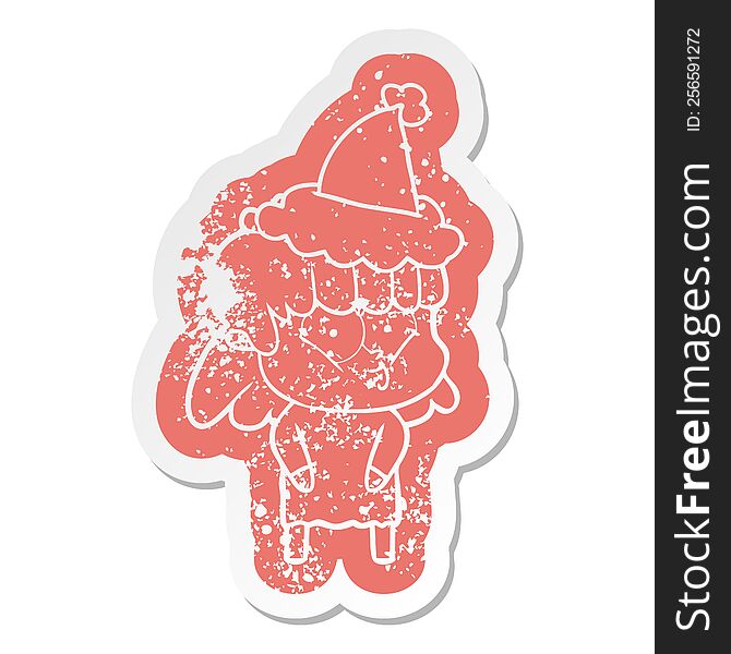 Cartoon Distressed Sticker Of A Whistling Girl Wearing Santa Hat