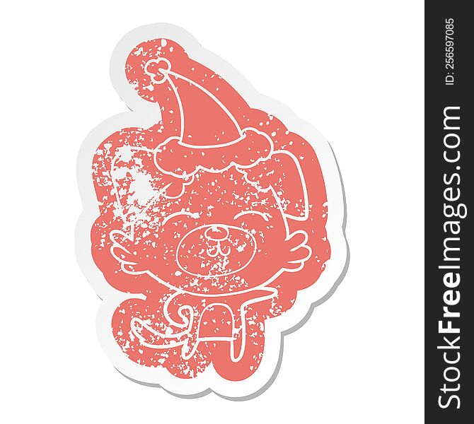 quirky cartoon distressed sticker of a dog pointing wearing santa hat