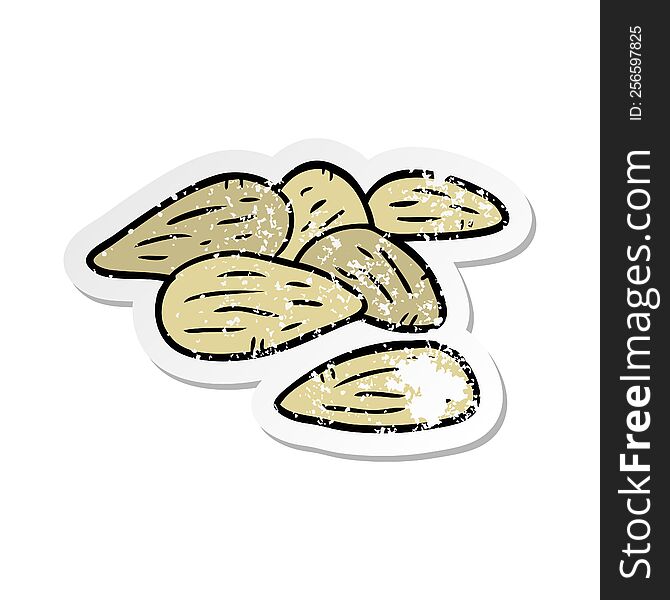distressed sticker of a cartoon almonds