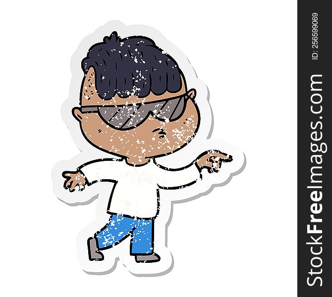 distressed sticker of a cartoon boy wearing sunglasses pointing