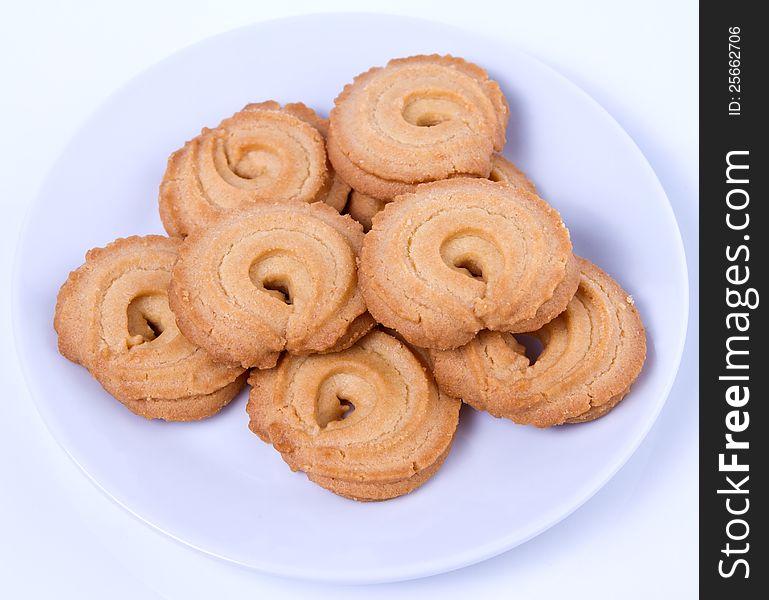 Cookies in the plate on white background. Cookies in the plate on white background