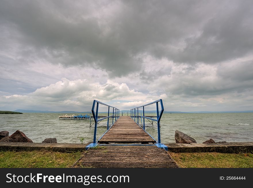 Wooden footbridge at beach of Balaton. Wooden footbridge at beach of Balaton