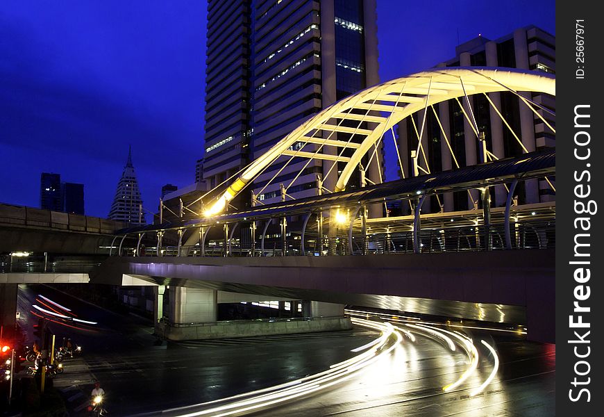 Pubic skywalk with modern buildings of Bangkok downtown square in business zone