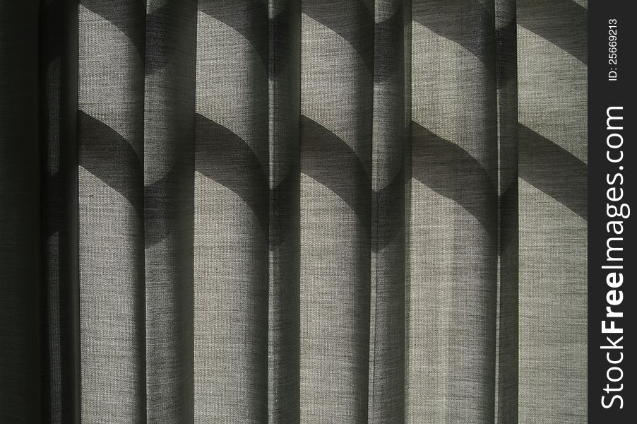 Shade on Grey Curtain, Sunlight Through a Window