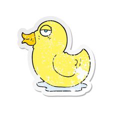 Retro Distressed Sticker Of A Cartoon Rubber Duck Stock Photos