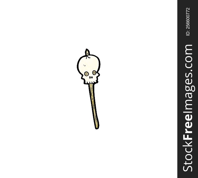 cartoon skull on spike