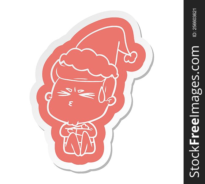 quirky cartoon  sticker of a man sweating wearing santa hat