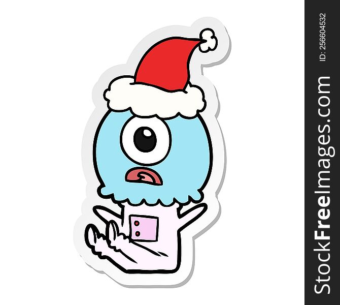 Sticker Cartoon Of A Cyclops Alien Spaceman Wearing Santa Hat