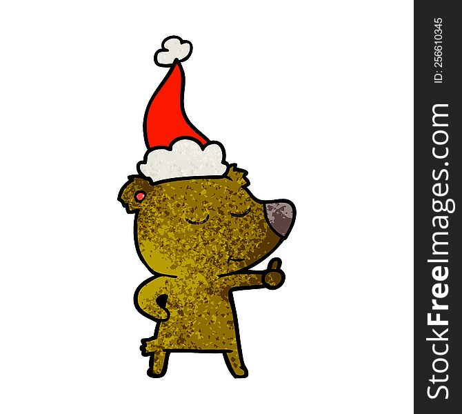 happy hand drawn textured cartoon of a bear giving thumbs up wearing santa hat
