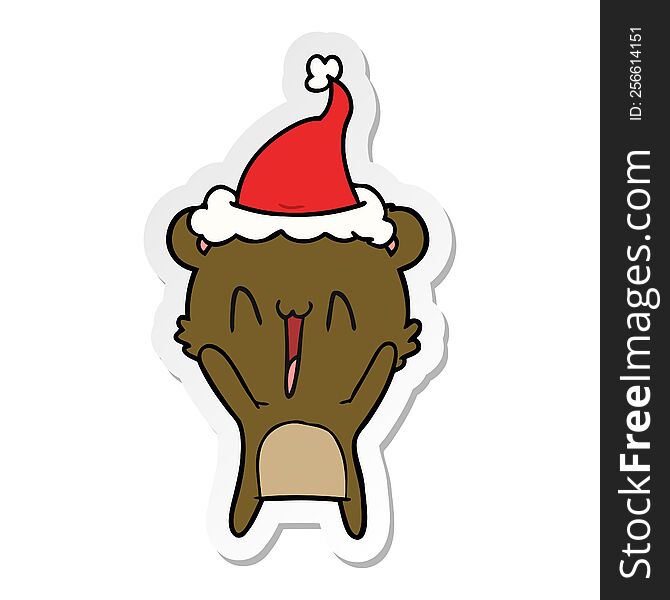 happy bear hand drawn sticker cartoon of a wearing santa hat. happy bear hand drawn sticker cartoon of a wearing santa hat