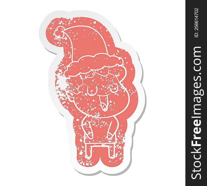 Laughing Cartoon Distressed Sticker Of A Man Wearing Santa Hat