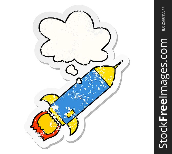 Cartoon Rocket And Thought Bubble As A Distressed Worn Sticker