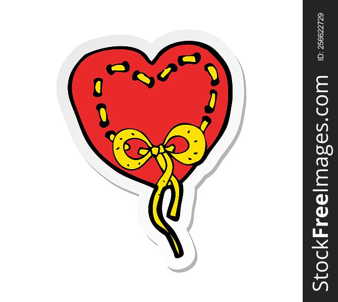 sticker of a stitched heart cartoon