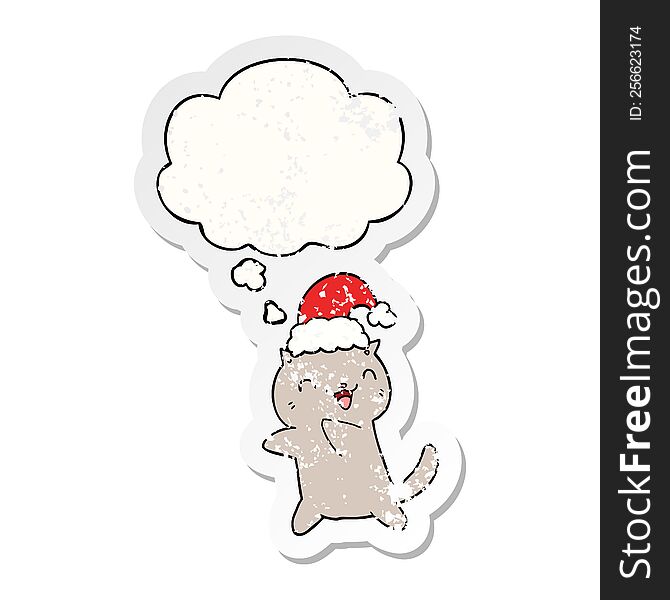 cute cartoon christmas cat with thought bubble as a distressed worn sticker