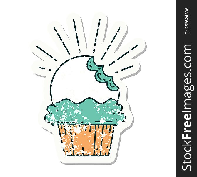 worn old sticker of a tattoo style cupcake with missing bite. worn old sticker of a tattoo style cupcake with missing bite