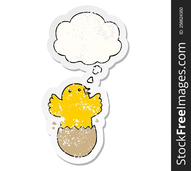cartoon hatching bird with thought bubble as a distressed worn sticker