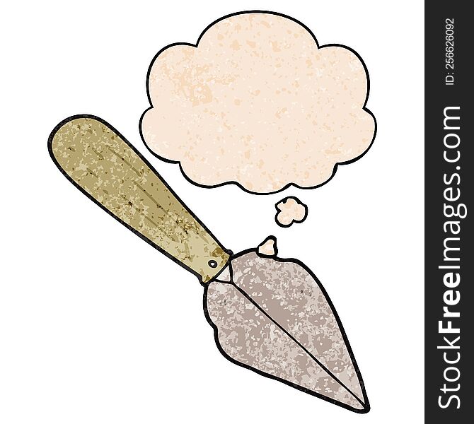 cartoon garden trowel with thought bubble in grunge texture style. cartoon garden trowel with thought bubble in grunge texture style