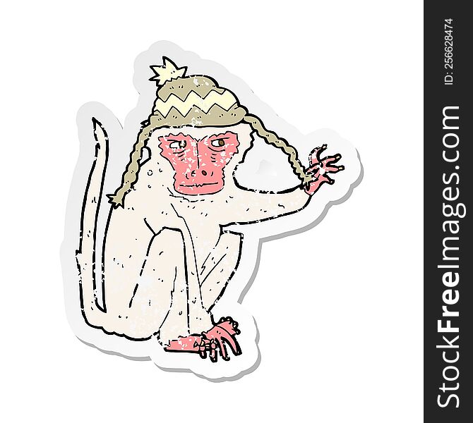 Retro Distressed Sticker Of A Cartoon Monkey Wearing Hat