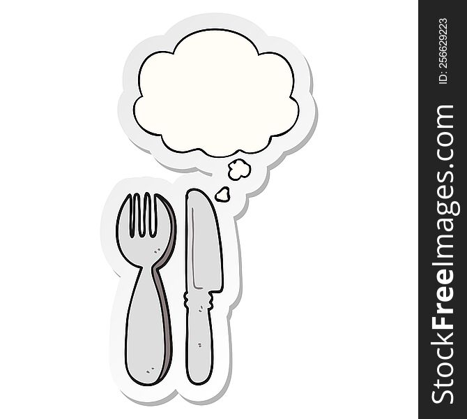 cartoon knife and fork with thought bubble as a printed sticker