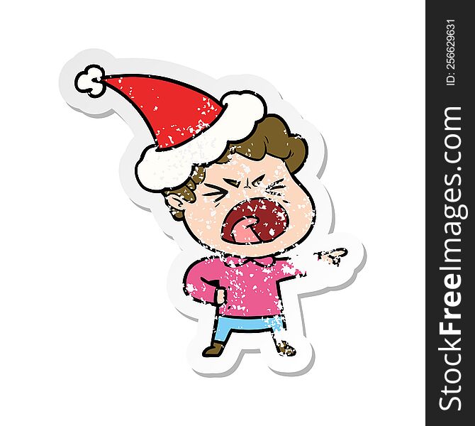 Distressed Sticker Cartoon Of A Furious Man Wearing Santa Hat